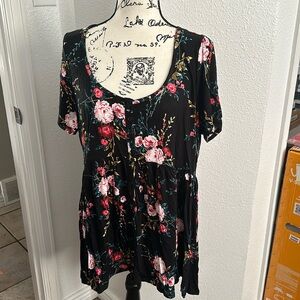 Brand new torrid top. Short in front longer in the back